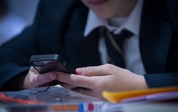 Teen using mobile technology