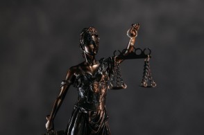 Close-up Photo of a Lady Justice Statuette